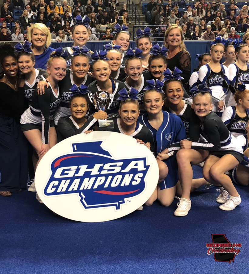 The competition cheerleading team poses for their first picture as State Champions. 