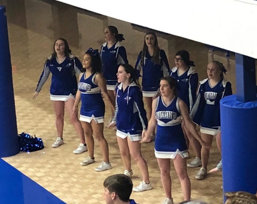  The basketball cheerleaders cheer on the intense basketball game at home, against Coosa. 