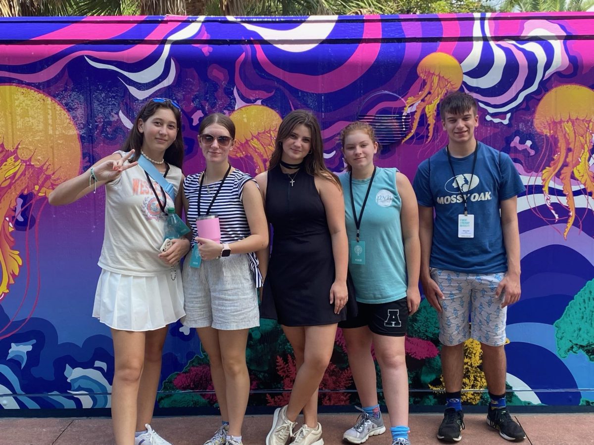 Isabella Howell and her group explore SeaWorld while at SLU.